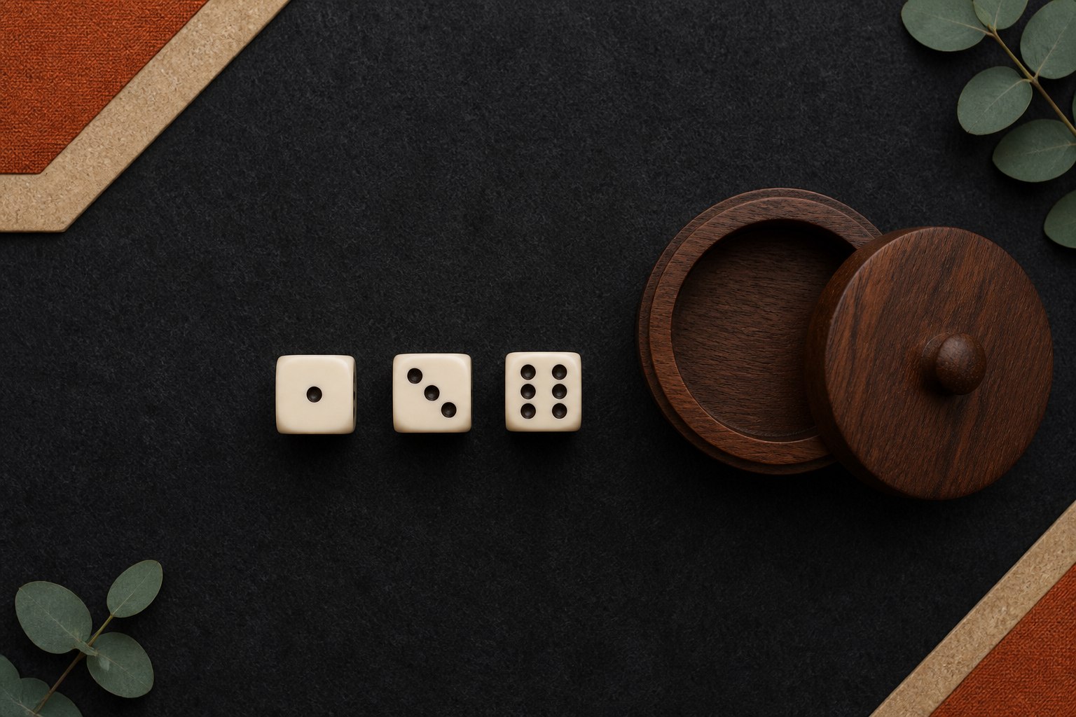Three sic bo dice and a wooden dice shaker viewed from above